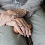 Old persons hands -relates to Retirement Age Dilemma: Should We Work Longer? the Pros and Cons of Raising Retirement Age