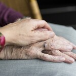 Hands of old age elderly couple - relates to Beyond Grandparents' Day Celebrations: Understanding Rights as a Pensioner