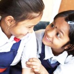 School girls chatting in the classroom -related to NEP: A Blueprint for India's Economic Future, Transforming Education