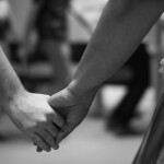 Black and white photo of couple holding hands - relates to Appreciating the Invisible: Wife Appreciation Day