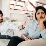 Indian couple having quarrel - relates to Splurging to Saving: Is the YOLO Party Over for Indian Cash-Conscious Consumer