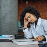 Stressed woman filing last minute ITR -relates to Last-Minute ITR Filing? Quick Guide with 25 Essential Tax Filing Tips!