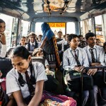 School kid traveling in a School bus - relates to Essential FAQs on Child Education Plans: Everything You Need to Know