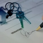 house keys, agreement papers