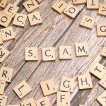 Tile letters creating the word SCAM - relates to Beware of the MGL Gas Bill Scam: Protect Yourself & Learn