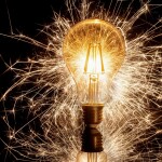 Glowing Light bulb and sparkler - relates to Beyond Retirement: Transferable Skills & Explore New Business Ideas
