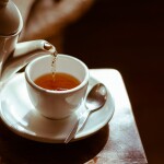 Hot Tea poured into a Tea Cup - relates to Chai Stall to Tea Empire: Inspiring Story of Navnath Yewale-Brewed to Success