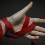 red tape, hand,
